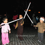 Kids playing with their swords at Disneyland